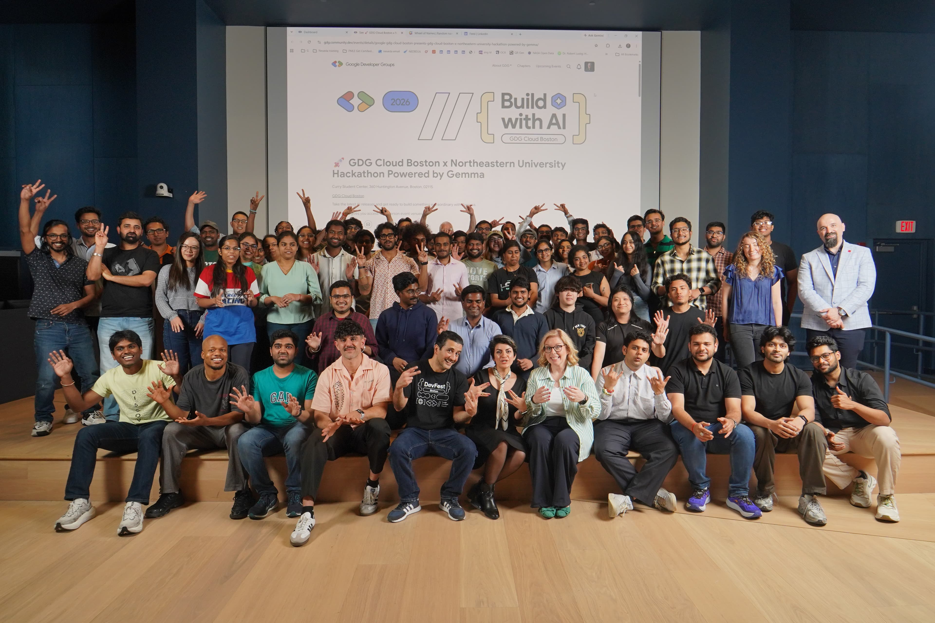 On stage at the GDG Cloud Boston × Northeastern hackathon